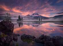 An Amazing Sunrise Show Over South Sister Peak Reflected In The Cool, Misty Waters Of Oregon's Sparks Lake, In The Three Sisters