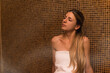 © Minerva Studio - Woman relaxing in a steam room