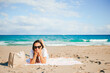 © travnikovstudio - Young beautiful woman on the beach vacation