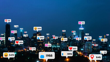 Social media icons fly over city downtown showing people reciprocity connection through social network application platform . Concept for online community and social media marketing strategy .