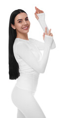 Wall Mural - Woman in warm thermal underwear on white background