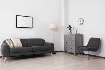 Sticker - Stylish room interior with sofa and other furniture