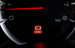 © Ratchapon - Car dashboard show status light icon BRAKE and steering wheel