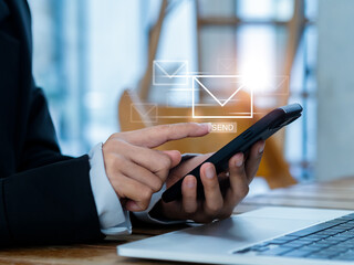Poster - Sending Email and business marketing concepts. Fast moving of digital letters icon appearing while business person using, mobile smart phone and laptop computer at workplace, send message.