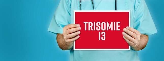 Wall Mural - Trisomie 13 (Pätau-Syndrom). Arzt zeigt rotes Schild mit medizinischen Wort. Blauer Hintergrund.