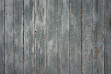 Weathered Gray Wood Texture. Background Made Of Wooden Boards Whose Paint Is Peeling Off.