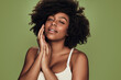 © kegfire - African American female touching hands