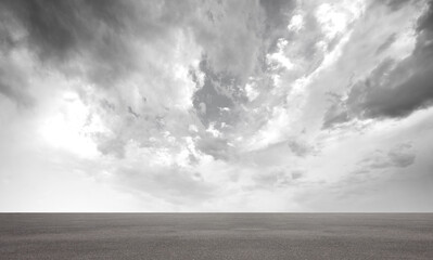 Wall Mural - dark dramatic storm cloud sky backround horizon scene with concrete street floor