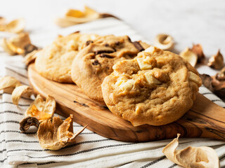 Poster - White chocolate cookies and chocolate cookies on a cutting board