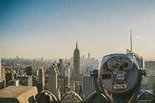 Viewpoint On City With Binocular