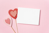 Fototapeta Kawa jest smaczna - Valentines day card mockup and hearts on pink paper background