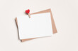 Valentines Day blank greeting card mockup with envelope and heart peg on white