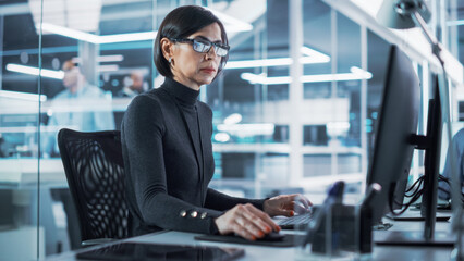 Poster - Adult Female Industrial Engineer Developing 3D Model of a Circuit Motherboard on Computer CAD Software in a Startup Facility. Modern Technological Research and Development Center.