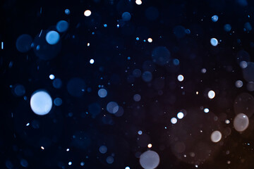 Wall Mural - closeup of dust particles on black background bokeh blur overlay effect with copy space for text. hi