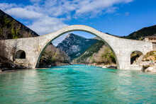 The Great Arched Stone Bridge Of Plaka On Arachthos River, Tzoumerka, Greece.