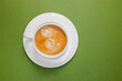 © Diana Vyshniakova - Cup of fresh espresso on the green background