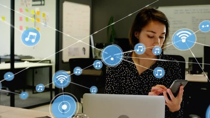 Poster - Animation of network of connection with icons over biracial businesswoman using laptop