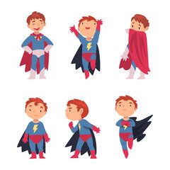 Canvas Print - Funny little boy in superhero costume set. Cute boy in cape in different poses cartoon vector illustration