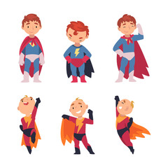 Canvas Print - Funny little boys in superhero costumes set. Happy cute boys in capes in different poses cartoon vector illustration