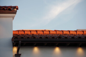 Wall Mural - Red tile roof edge in evening light