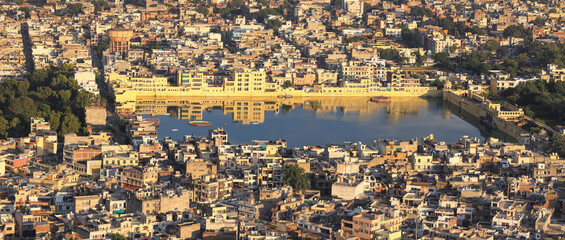 Wall Mural - Panoramic view of Jaipur cityscape, Many structures built around Tal Katora Lake in Jaipur city, Rajasthan, India.