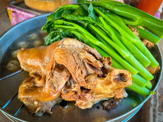 Wall Mural - Stewed leg pork with sweet gravy sauce style chinese food or Asian Thai food stewed leg pork in the steaming pot with eggs vegetable kale