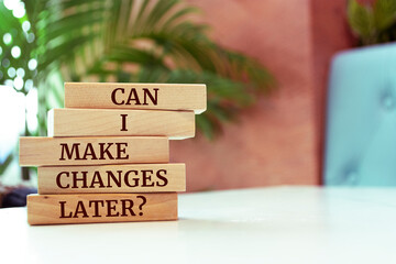 Poster - Wooden blocks with words 'Can I Make Changes Later?'.