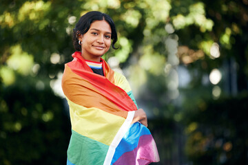 Wall Mural - Portrait, woman and rainbow flag for pride, support and lgbtq awareness, sexuality freedom and queer. Female, girl and they with equality, love and gender neutral lifestyle for activism and festival