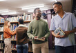 © S Fanti/peopleimages.com - Education, students or friends in library at university, college or school learning, talking or studying. Studying, scholarship or young men with books for knowledge growth or future development