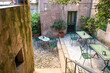 © ksl - Outdoor seating area in the courtyard of a famous pastry shop in the mountain village of Erice in western Sicily