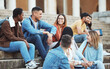 © S Fanti/peopleimages.com - Laughing students, bonding or university stairs on college campus for group study, diversity class break or open day social. Smile, happy or talking friends, education learning goals on school steps
