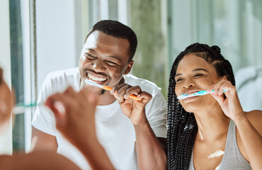 Sticker - Brushing teeth, dental and oral hygiene with a black couple grooming together in the bathroom of their home. Health, tooth care and cleaning with a man and woman bonding during their morning routine