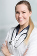young female family doctor with stethoscope looking friendly