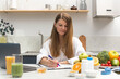 A nutritionist writes an appointment for vitamins and supplements and draws up a nutrition plan 