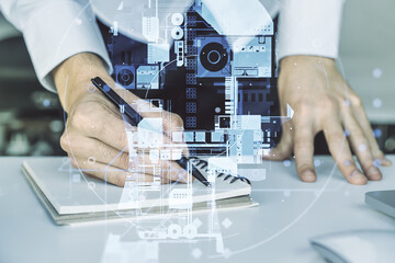 Poster - Double exposure of creative human head microcircuit with hand writing in notepad on background with laptop. Future technology and AI concept