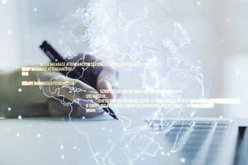 Poster - Double exposure of abstract programming language with world map and hand writing in notebook on background with laptop, research and development concept