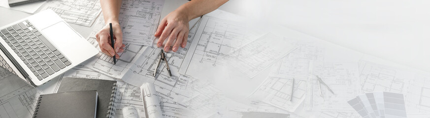 Wall Mural - Architects concept, engineer architect designer freelance work on start-up project drawing, construction plan. architect design working drawing sketch plans blueprints and making construction model