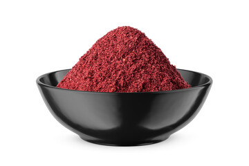 Wall Mural - Dry ground sumac in black bowl isolated on white. Front view.