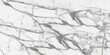 Bianco carrara marble texture background with greyish white base. White marble stone for fireplaces, ceramic slab tile, bathroom walls tile and kitchen interior-exterior home décor. Glossy satvario.