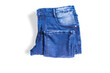 folded blue jeans pant isolated white background