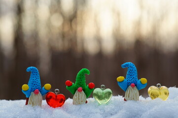 Sticker - Figurines of little gnomes and colorful toy hearts.