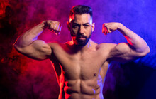 Muscular Man Showing Biceps