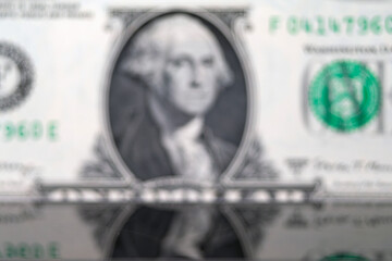 Blurry American dollar currency background. Out of focus paper currency