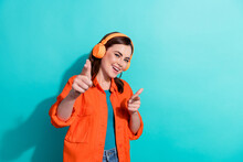 Photo Of Cheerful Lady Wear Stylish Clothes Hands Showing You Advise Choose Quality Earbuds Empty Space Isolated On Cyan Color Background