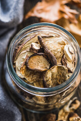 Wall Mural - Sliced dried mushrooms in jar.