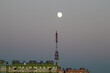 telephone network tower with moon
