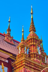 Sticker - The towers and hti umbrellas of Wat Saen Muang Ma, Chiang Mai, Thailand