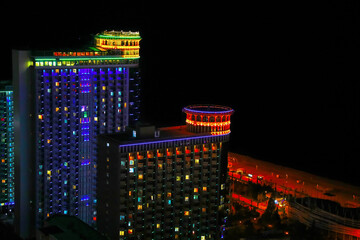 Wall Mural - Picturesque view of city with buildings at night