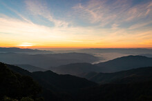 Beautiful Sunrise Over The Mountain Range At Doi Phu Kha National Park Of Thailand.
