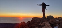 Girl On The Summit Of El Teide Vulcano At Sunrise, Tenerife, Spain